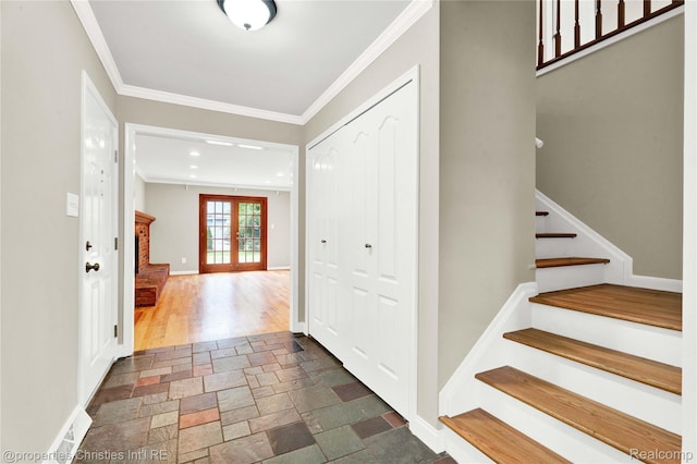 4770 Hedgewood Dr, Bloomfield Hills, MI 48301 - foyer entrance with stone tile flooring, stairway, and ornamental molding