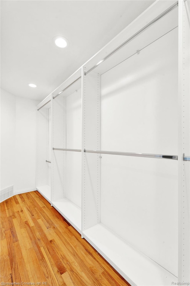 4770 Hedgewood Dr, Bloomfield Hills, MI 48301 - spacious closet featuring light wood-type flooring