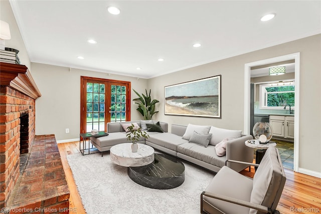 4770 Hedgewood Dr, Bloomfield Hills, MI 48301 - living room featuring recessed lighting, plenty of natural light, a fireplace, ornamental molding, and wood finished floors
