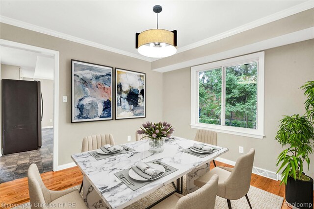 4770 Hedgewood Dr, Bloomfield Hills, MI 48301 - dining area with ornamental molding and wood finished floors