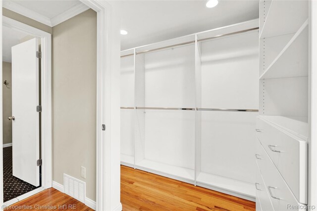 4770 Hedgewood Dr, Bloomfield Hills, MI 48301 - spacious closet featuring wood finished floors