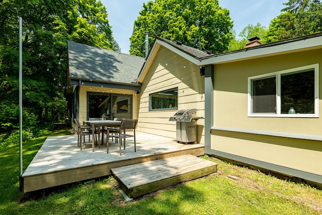 2012 Pontiac Trl, Ann Arbor, MI 48105 - wooden terrace with a yard, outdoor dining space, and a grill