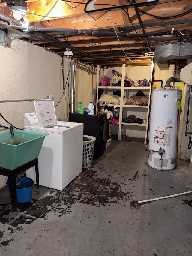 34516 John St, Wayne, MI 48184 - unfinished basement featuring gas water heater and washer / dryer