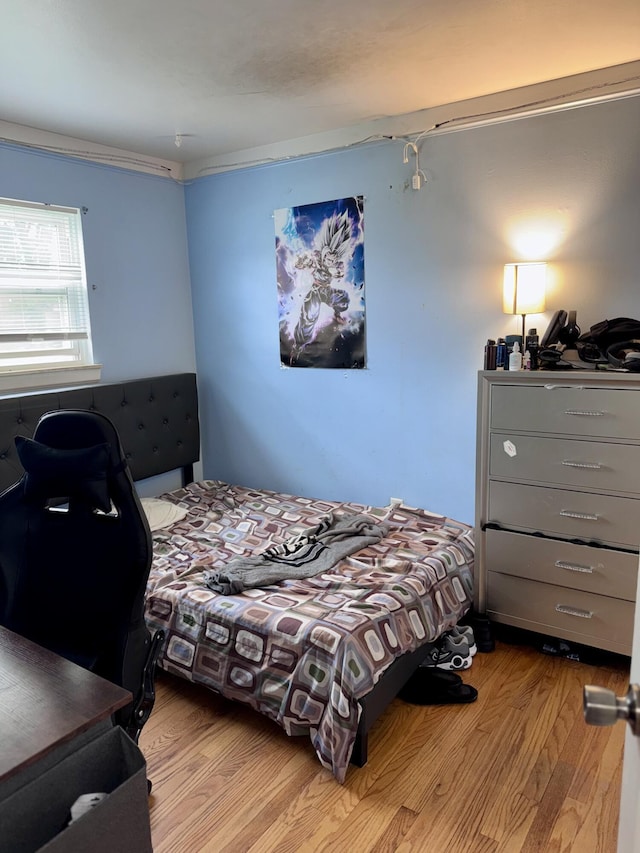 34516 John St, Wayne, MI 48184 - bedroom with wood finished floors and an office area