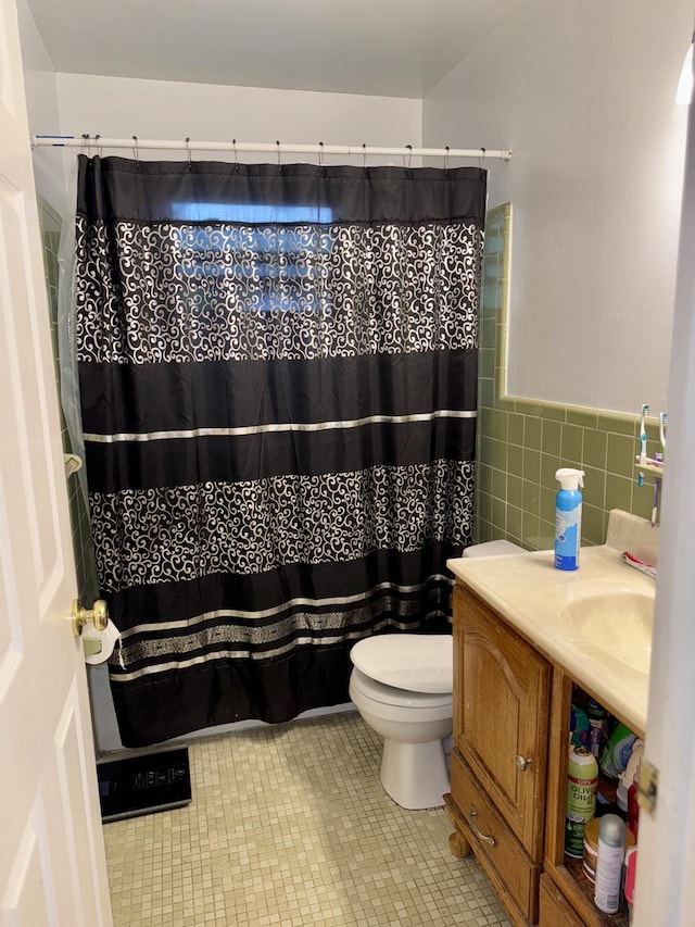 34516 John St, Wayne, MI 48184 - bathroom with tile walls, tile patterned flooring, vanity, a wainscoted wall, and a shower with shower curtain