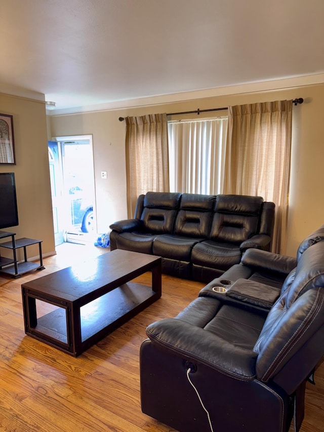 34516 John St, Wayne, MI 48184 - living area featuring ornamental molding and wood finished floors