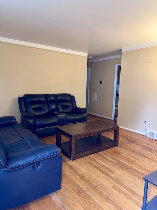 34516 John St, Wayne, MI 48184 - living area with crown molding and wood finished floors