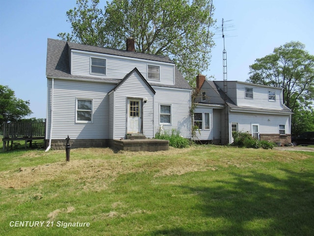 7300 Corunna Rd, Swartz Creek, MI 48473 - view of front of home featuring a chimney, a front yard, and roof with shingles