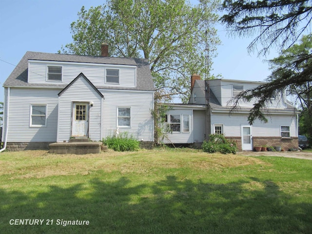 7300 Corunna Rd, Swartz Creek, MI 48473 - view of front of home with a chimney and a front yard