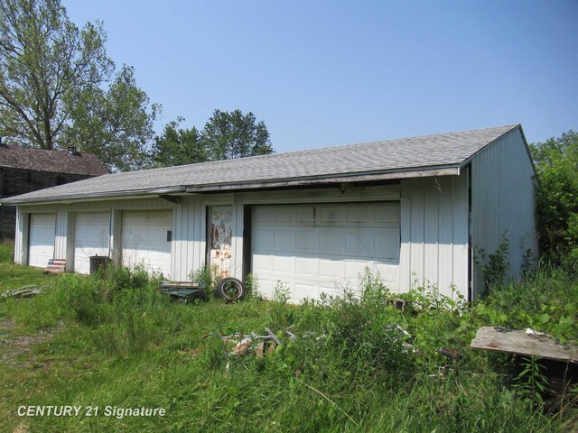 7300 Corunna Rd, Swartz Creek, MI 48473 - view of front of house with an outdoor structure
