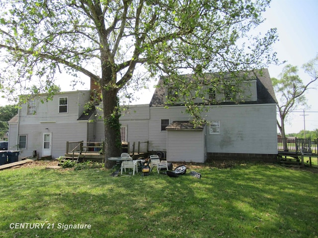 7300 Corunna Rd, Swartz Creek, MI 48473 - back of property featuring a wooden deck and a yard