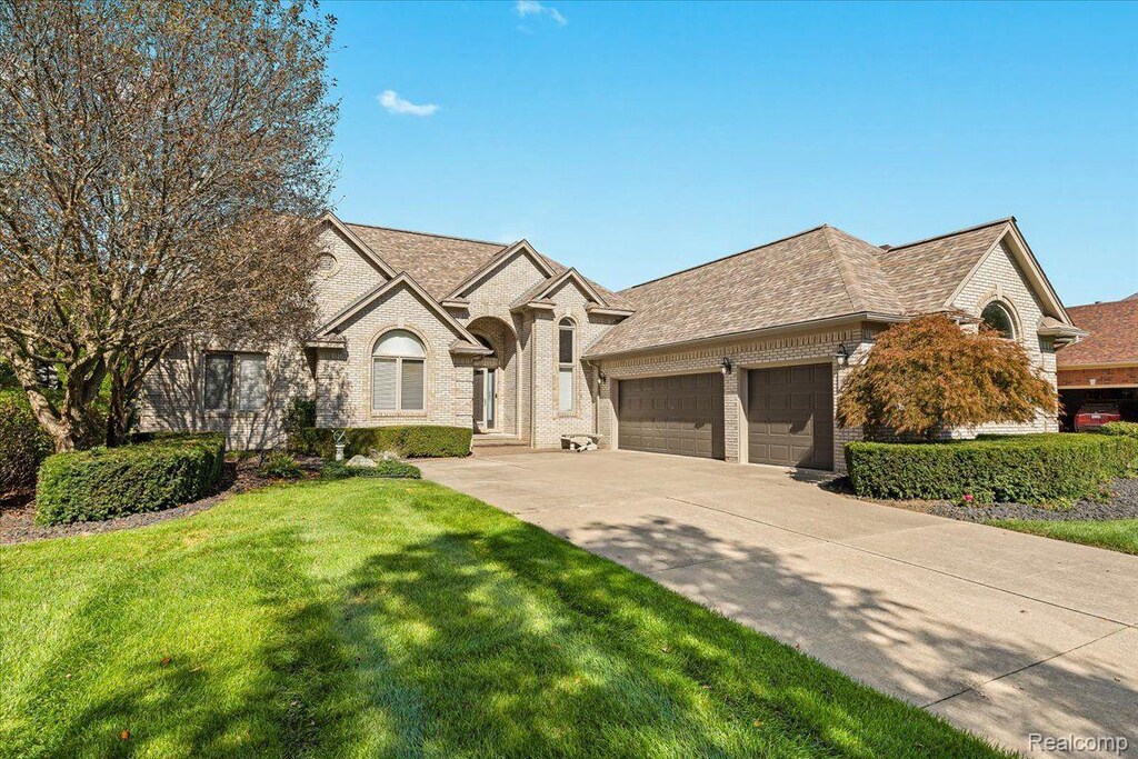 57563 Stonebriar Dr, Washington, MI 48094 - photo 1