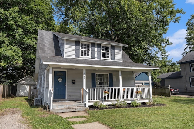 109 N Lincoln Ave, Niles, MI 49120 - view of front of home with a porch and a storage unit