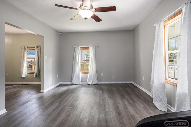 109 N Lincoln Ave, Niles, MI 49120 - unfurnished room with dark wood-style flooring and ceiling fan