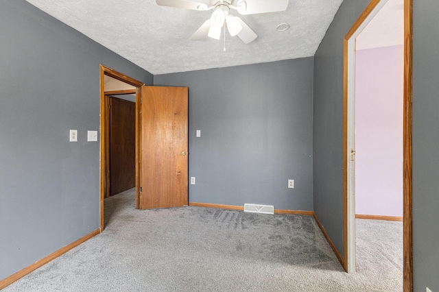 109 N Lincoln Ave, Niles, MI 49120 - carpeted empty room with a textured ceiling and ceiling fan