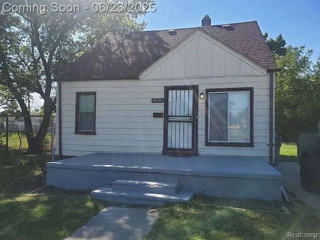 4080 Isabelle St, Dearborn, MI 48141 - view of front of house with roof with shingles and board and batten siding