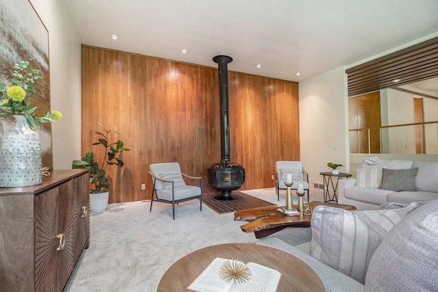 13 Regent Dr, Ann Arbor, MI 48104 - carpeted living room featuring a wood stove and recessed lighting