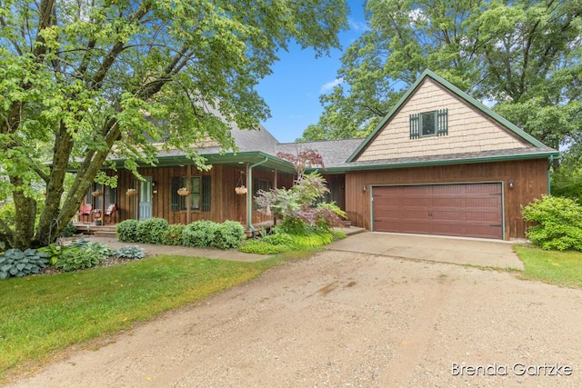 17318 Thunder Bay Ct, Howard City, MI 49329 - view of front of house with driveway and covered porch