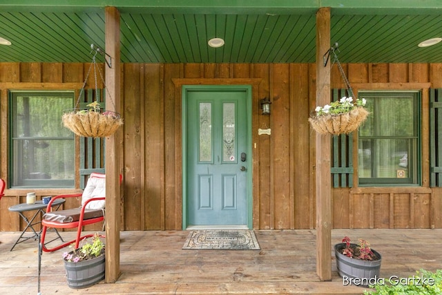 17318 Thunder Bay Ct, Howard City, MI 49329 - property entrance with board and batten siding
