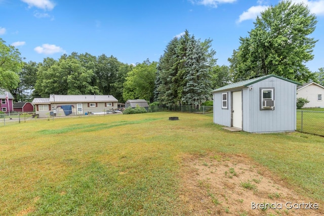 17318 Thunder Bay Ct, Howard City, MI 49329 - fenced backyard with a storage unit