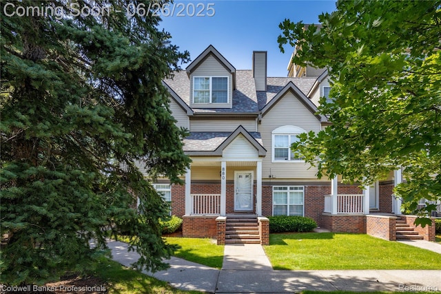 880 Seville Row, Detroit, MI 48202 - view of front facade featuring a chimney, a front lawn, brick siding, and roof with shingles