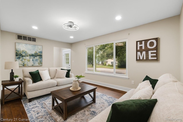 6262 Garden Ct, Warren, MI 48091 - living area with dark wood finished floors and recessed lighting