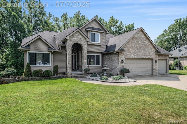 2390 Torrey Grove Ct, Fenton, MI 48430 - view of front of house featuring concrete driveway, an attached garage, a front lawn, brick siding, and a shingled roof