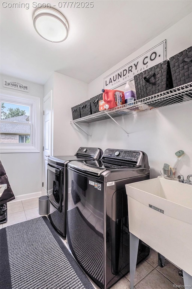 2390 Torrey Grove Ct, Fenton, MI 48430 - washroom featuring light tile patterned floors and washer and dryer