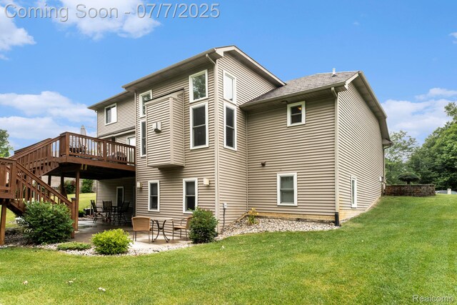 2390 Torrey Grove Ct, Fenton, MI 48430 - rear view of house featuring a patio area, a wooden deck, a lawn, and stairs