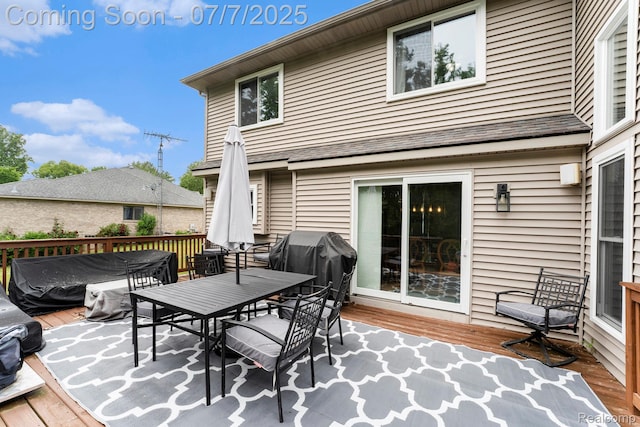 2390 Torrey Grove Ct, Fenton, MI 48430 - view of patio / terrace with outdoor dining area, a deck, and area for grilling