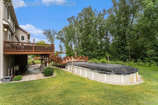 2390 Torrey Grove Ct, Fenton, MI 48430 - view of grassy yard with a deck, a covered pool, and stairs