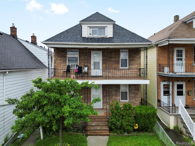 11727 Fleming St, Hamtramck, MI 48212 - view of front of property featuring roof with shingles, covered porch, and a balcony