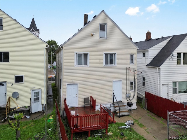11727 Fleming St, Hamtramck, MI 48212 - rear view of house with entry steps and a deck