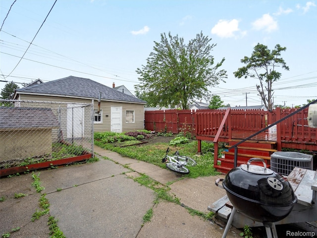 11727 Fleming St, Hamtramck, MI 48212 - view of yard with a wooden deck and an outdoor structure