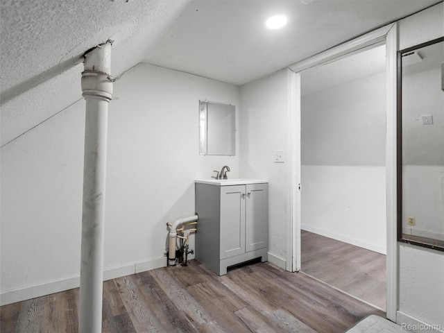 11727 Fleming St, Hamtramck, MI 48212 - laundry area with a sink and wood finished floors