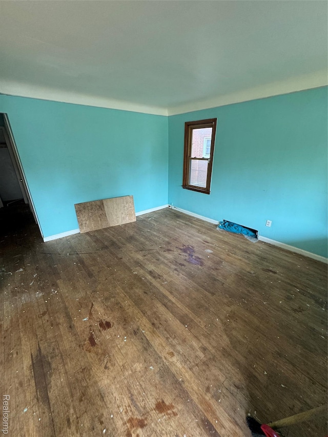 19421 Huntington Rd, Detroit, MI 48219 - spare room with hardwood / wood-style flooring and baseboards
