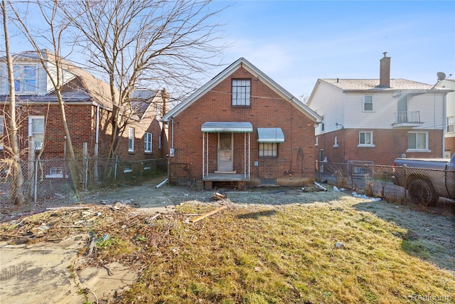 14903 Tracey St, Detroit, MI 48227 - back of property featuring brick siding and a fenced backyard
