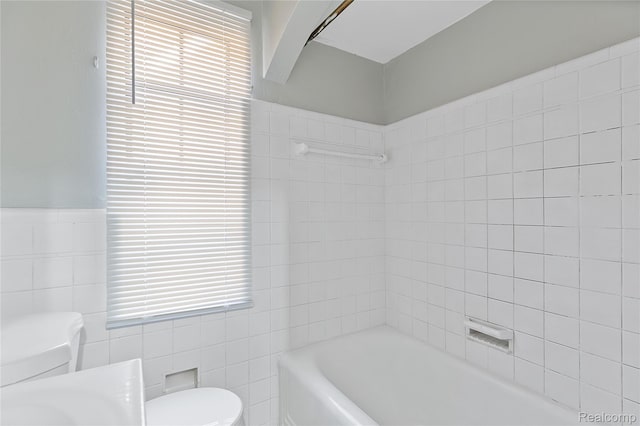 14903 Tracey St, Detroit, MI 48227 - bathroom featuring tile walls and shower / washtub combination