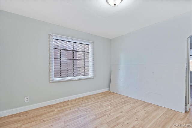 14903 Tracey St, Detroit, MI 48227 - empty room featuring wood finished floors and baseboards