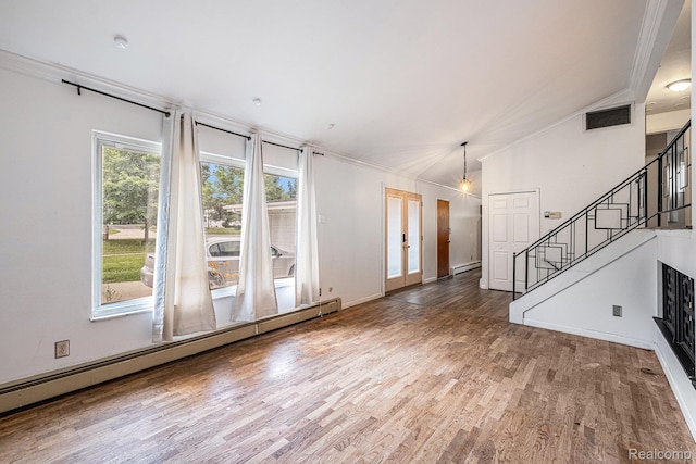 720 E Grand Blanc Rd, Grand Blanc, MI 48439 - unfurnished living room featuring crown molding, wood finished floors, a baseboard heating unit, stairway, and lofted ceiling