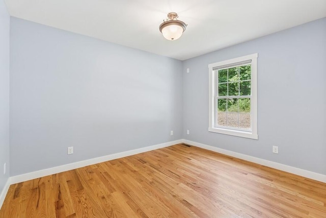 450 Carefree Ct, Niles, MI 49120 - empty room with baseboards and wood finished floors