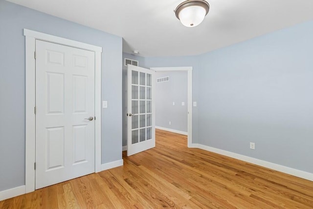 450 Carefree Ct, Niles, MI 49120 - unfurnished room featuring light wood finished floors and french doors