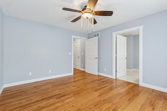450 Carefree Ct, Niles, MI 49120 - unfurnished bedroom with light wood finished floors and a ceiling fan