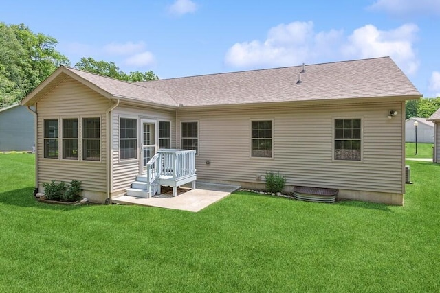 450 Carefree Ct, Niles, MI 49120 - back of property with a yard and roof with shingles