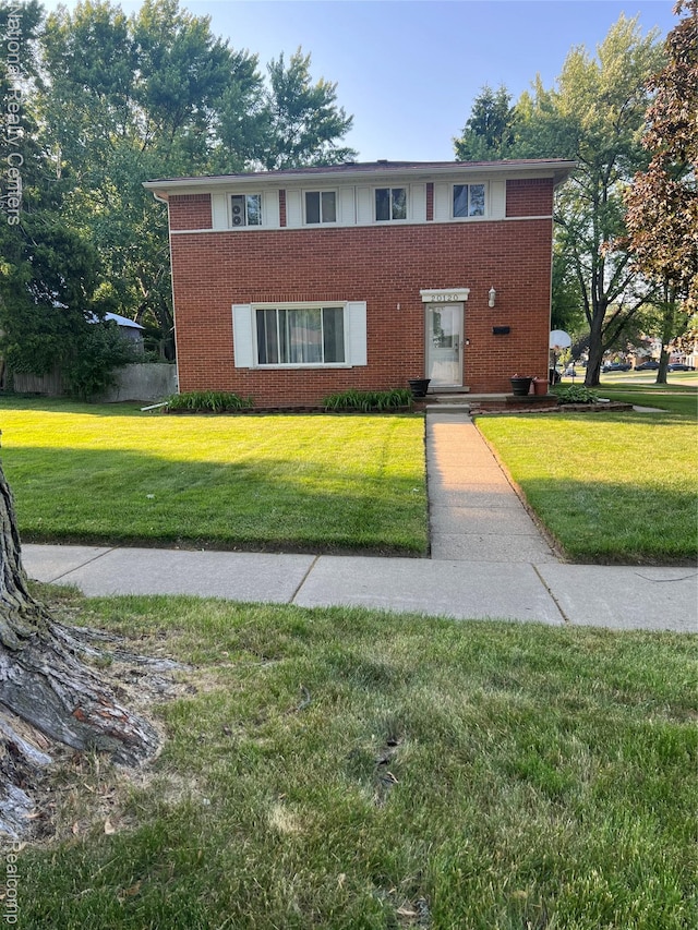 20120 N Covington Pkwy, Southfield, MI 48221 - view of front of house with brick siding and a front yard