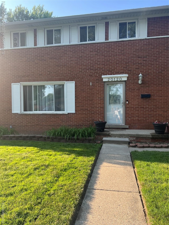 20120 N Covington Pkwy, Southfield, MI 48221 - view of front of property with brick siding and a front lawn