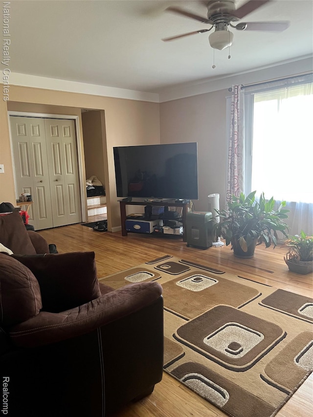 20120 N Covington Pkwy, Southfield, MI 48221 - living room featuring ceiling fan, wood finished floors, and ornamental molding