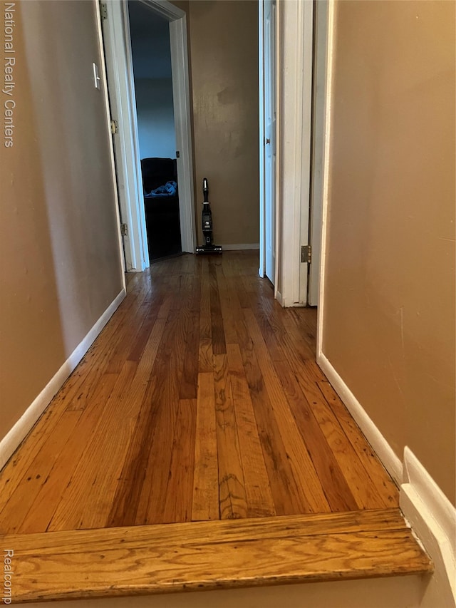 20120 N Covington Pkwy, Southfield, MI 48221 - hallway featuring hardwood / wood-style flooring and baseboards