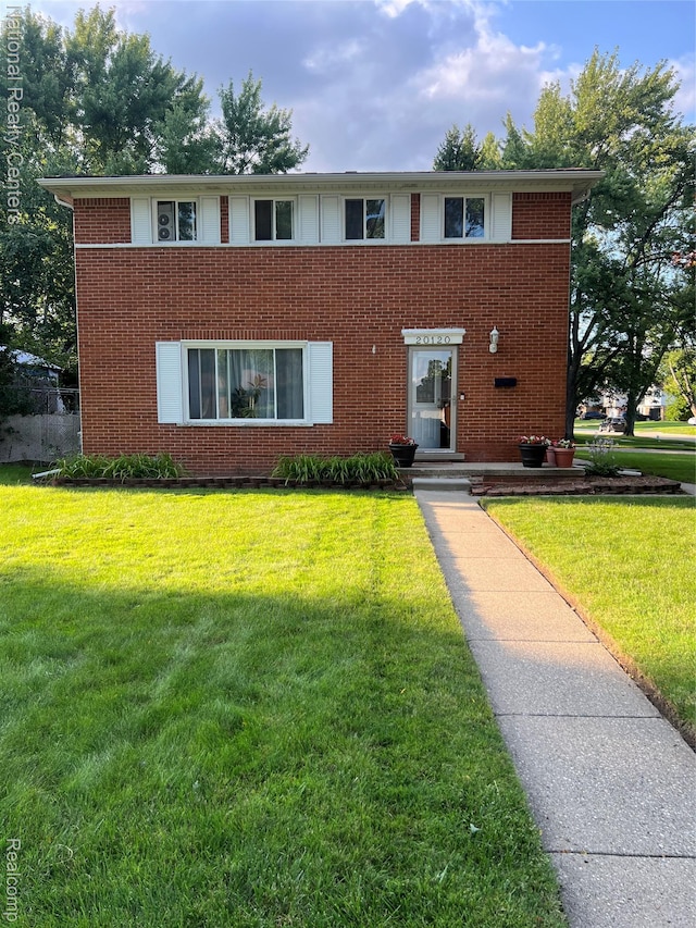 20120 N Covington Pkwy, Southfield, MI 48221 - view of front of house with a front yard and brick siding