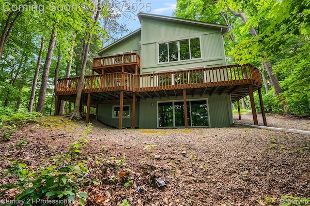 7340 Deer Lake Rd, Clarkston, MI 48346 - rear view of house featuring a wooden deck